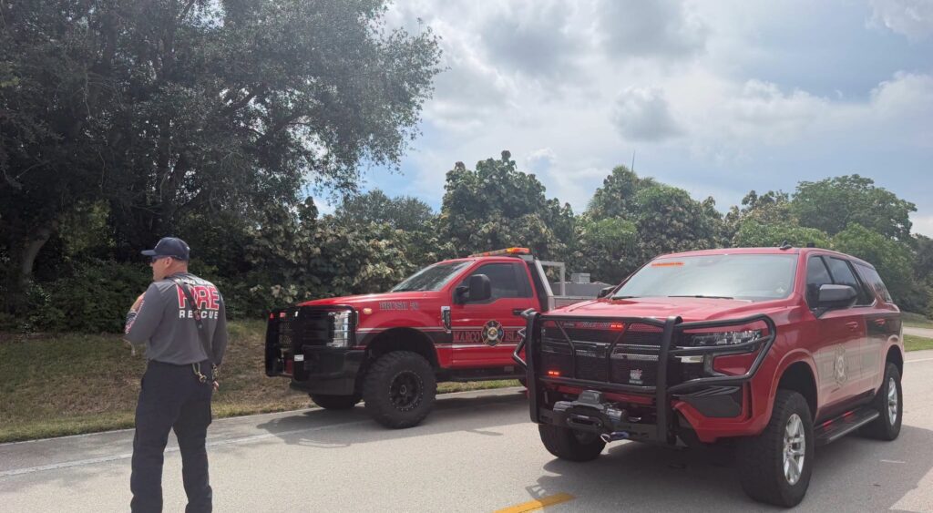 Brush Fire Sparks Power Outages Along Whiskey Creek Drive, Crews Remain on Scene
